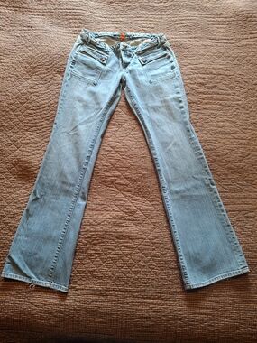 Yanuk Light Blue Flared Jeans with Front Pocket Detail
